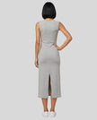 Woman wearing the ContourEase Sleeveless Maxi Dress in Flower Gray, back view showing slim silhouette and back slit