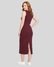 Woman wearing the ContourEase Sleeveless Maxi Dress in Wine Red, back view showing slim silhouette and back slit
