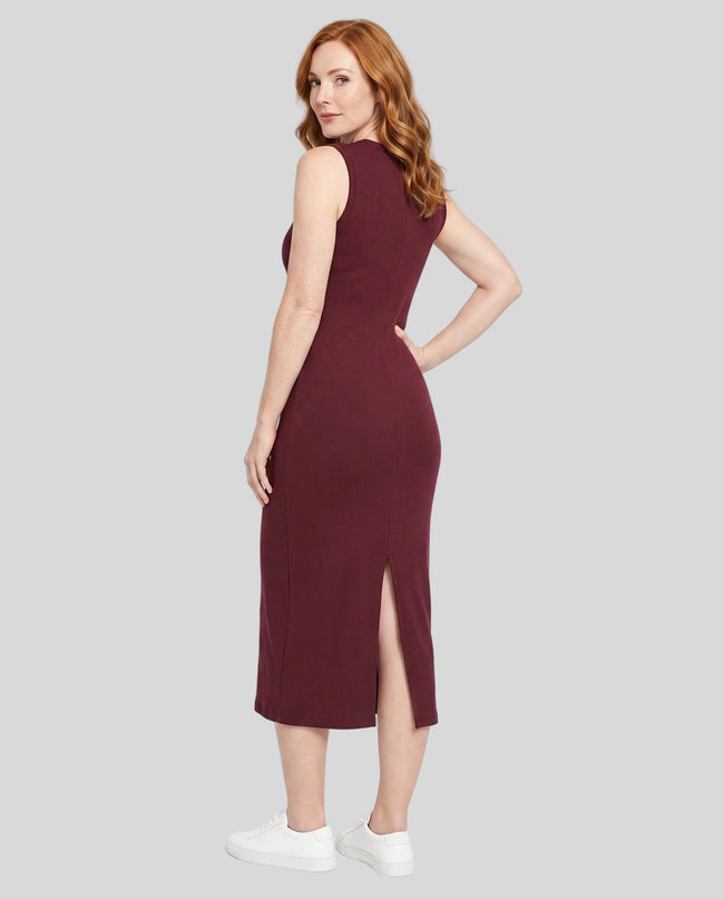 Woman wearing the ContourEase Sleeveless Maxi Dress in Wine Red, back view showing slim silhouette and back slit