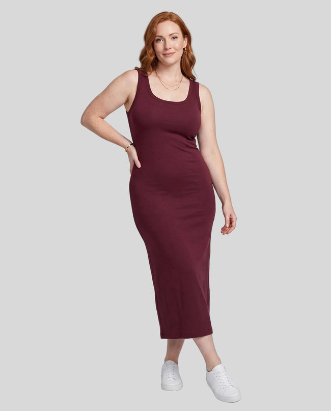 Woman wearing the ContourEase Sleeveless Maxi Dress in Wine Red, front view showing slim body-skimming silhouette