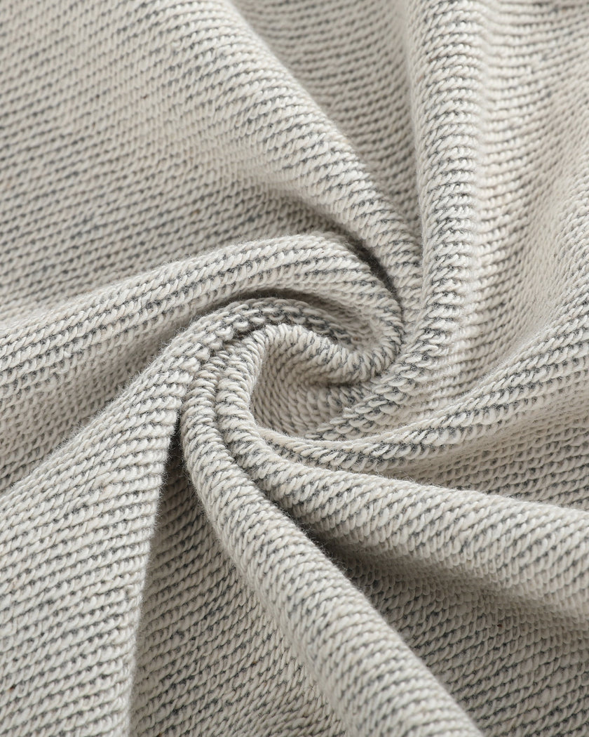 Detailed view of midweight cotton-blend knit construction on ContourEase Stand Collar Jacket