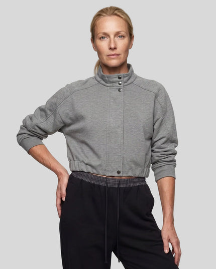 Upper body front view of woman in her 50's wearing ContourEase Stand Collar Jacket in Flower Gray