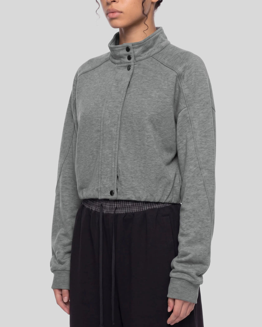 Upper body front angle view of woman wearing ContourEase Stand Collar Jacket in Flower Gray