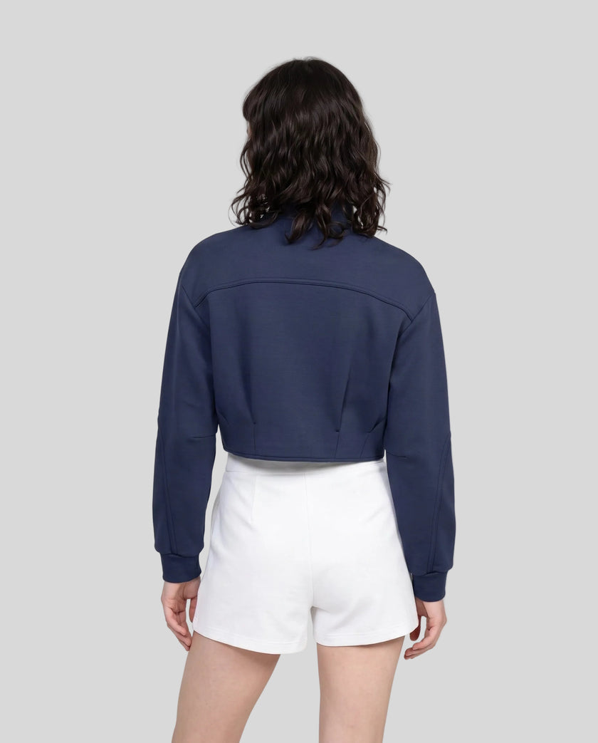Upper body back view of woman wearing ContourEase Stand Collar Jacket in Navy Blue