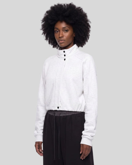 Upper body front angle view of woman wearing ContourEase Stand Collar Jacket in Oat Gray