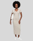 Woman wearing the ContourEase V-Neck Maxi Dress in Light Gray, front view showing V-neckline and slim fit