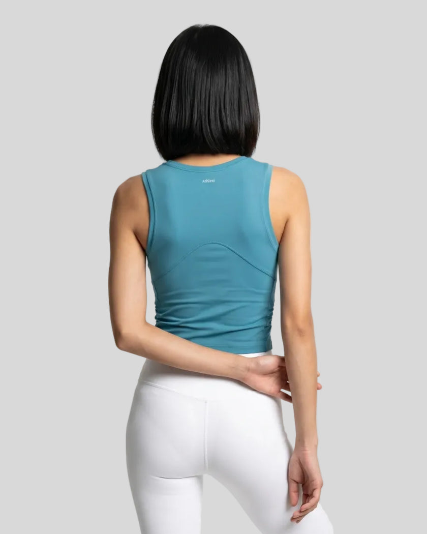 Back view of the ContourForm Studio Tank in lake blue