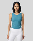 Model wearing the ContourForm Studio Tank in lake blue front view
