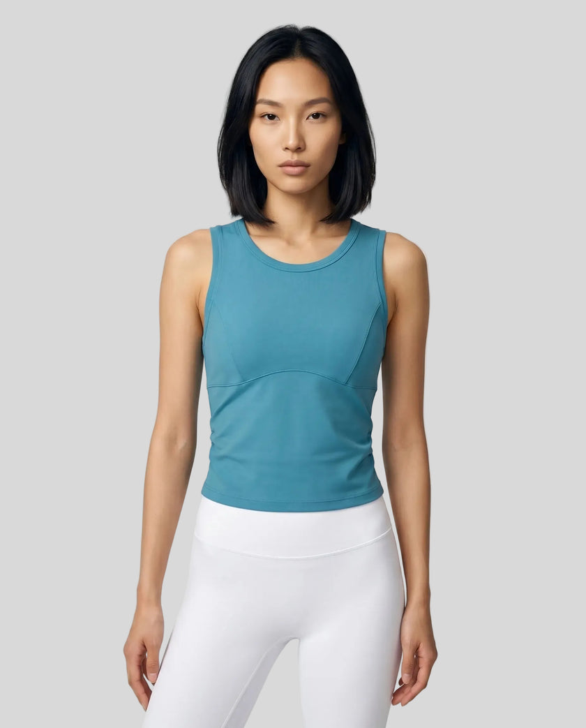 Model wearing the ContourForm Studio Tank in lake blue front view