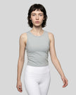 Model wearing the ContourForm Studio Tank in light gray front view