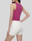Angled back view of the ContourForm Studio Tank highlighting the streamlined fit and panel construction