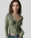 Mid shot of model wearing an army green ContourZip Ribbed Jacket with jeans in a clean studio setting