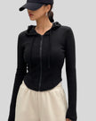 ContourZip Ribbed Jacket in black front closed view showing sculpted silhouette