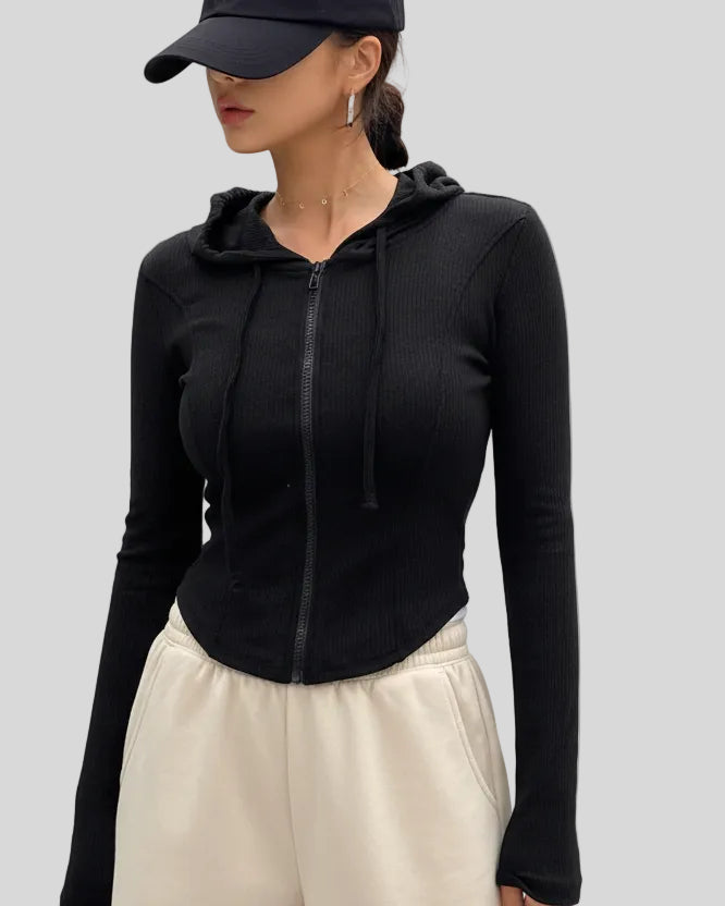 ContourZip Ribbed Jacket in black front closed view showing sculpted silhouette