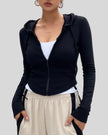 ContourZip Ribbed Jacket in black front half open view highlighting fit and zip closure