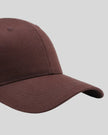 CoreForm Essential Cap in brown right side close-up highlighting curved brim and panel structure