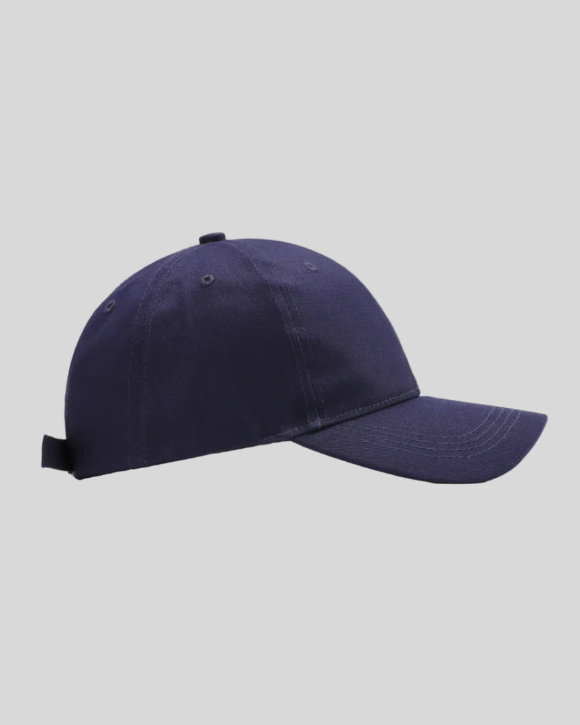 CoreForm Essential Cap in dark blue side view with structured crown and curved brim