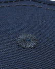 CoreForm Essential Cap in dark blue top interior close-up showing stitching and fabric texture