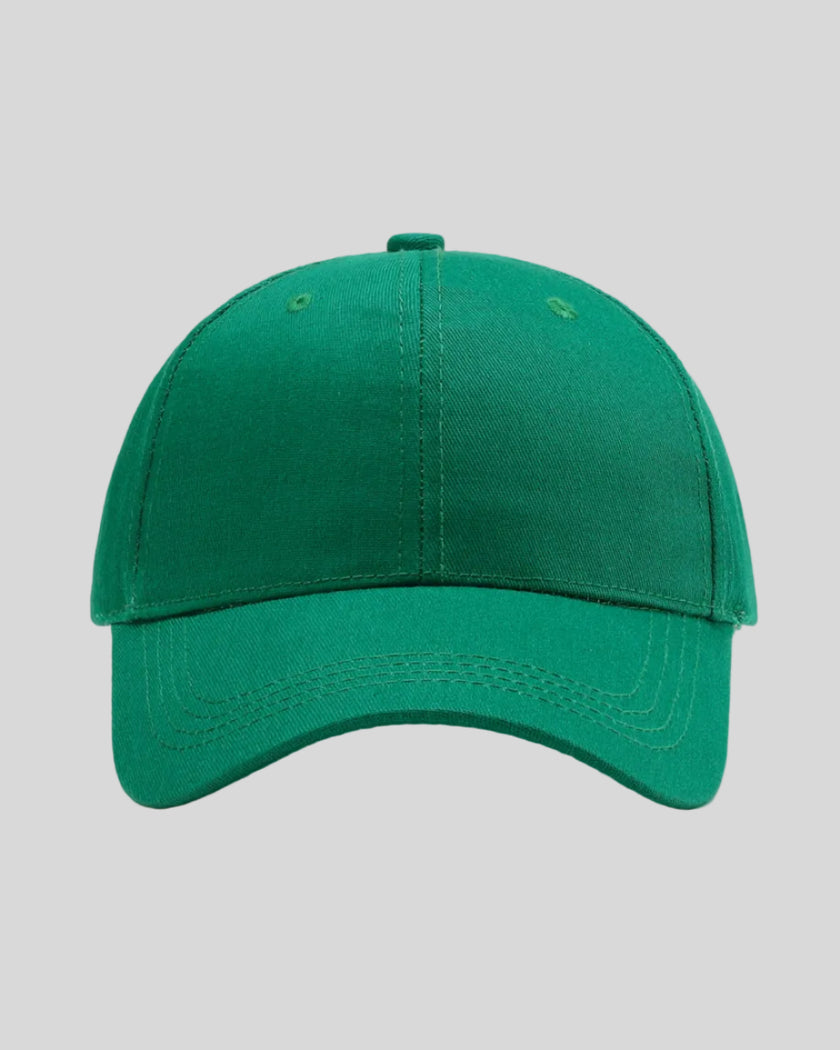 CoreForm Essential Cap in dark green front view with structured crown and curved brim