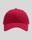 CoreForm Essential Cap in red front view with structured crown and curved brim