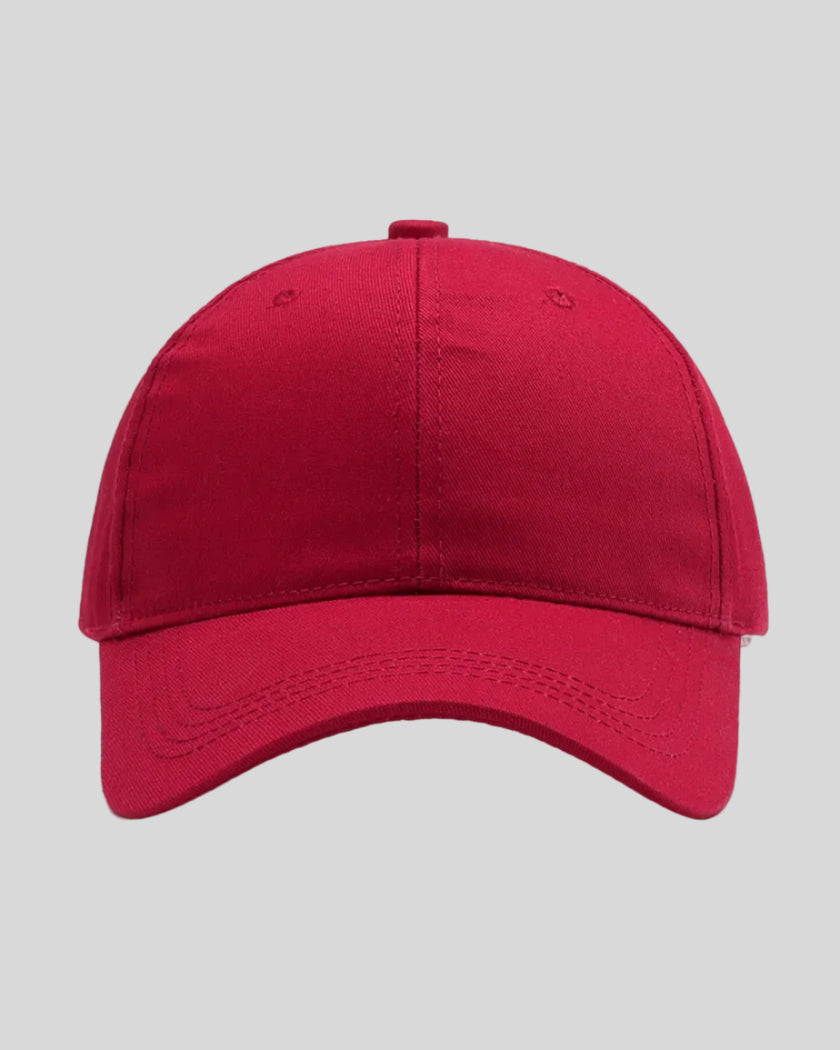 CoreForm Essential Cap in red front view with structured crown and curved brim