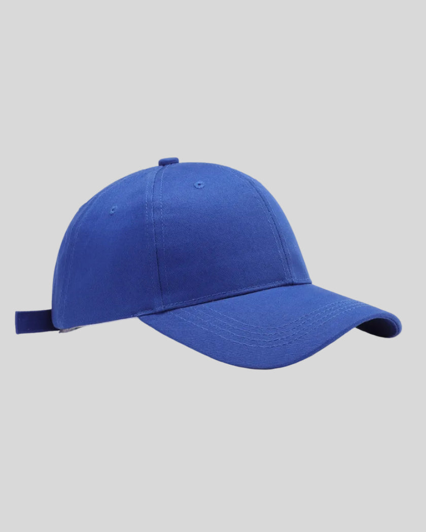 CoreForm Essential Cap in royal blue front angle view with structured crown and curved brim