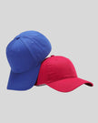 CoreForm Essential Cap in royal blue and red front angle view with structured crown and curved brim
