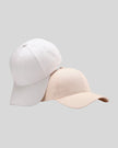 CoreForm Essential Cap in white and cream front angle view with structured crown and curved brim