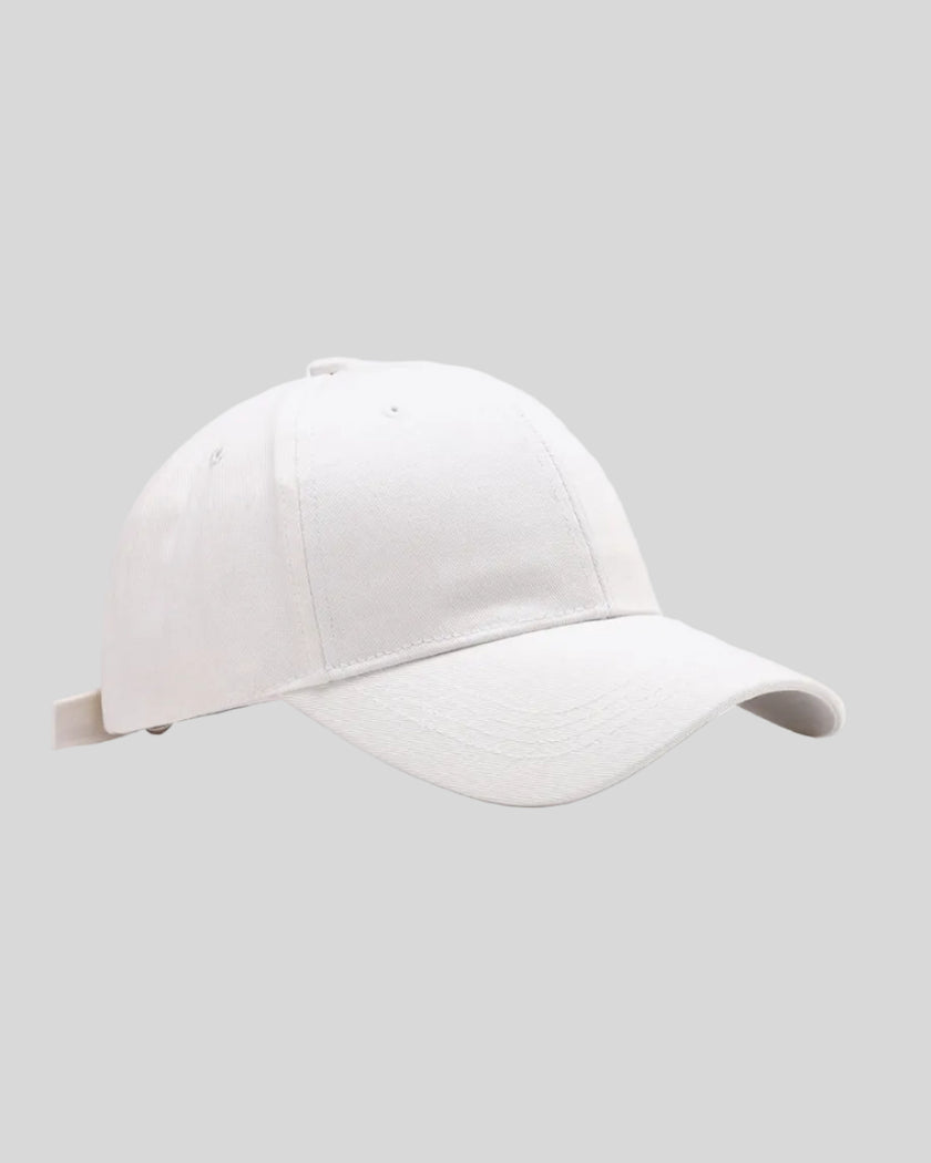 CoreForm Essential Cap in white front angle view with structured crown and curved brim