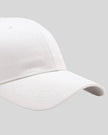 CoreForm Essential Cap in white right side close-up highlighting curved brim and panel structure