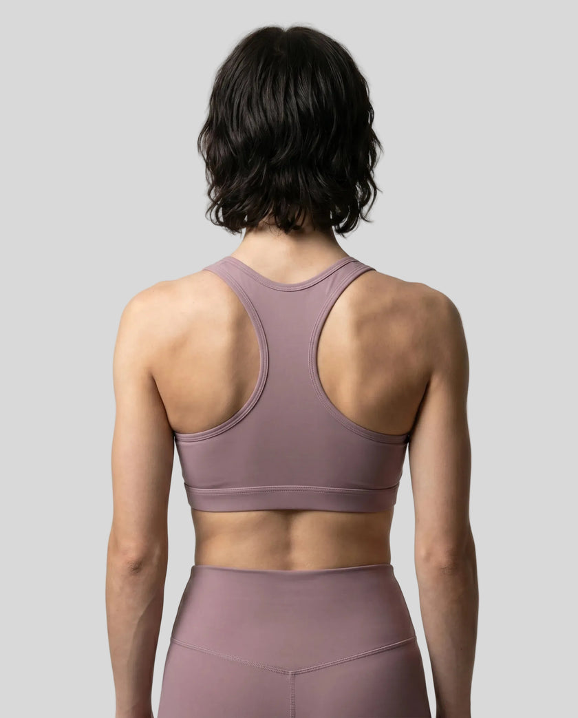 CoreForm Sports Bra in ash purple, back view styled on model