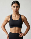 CoreForm Sports Bra in black, front view styled on model