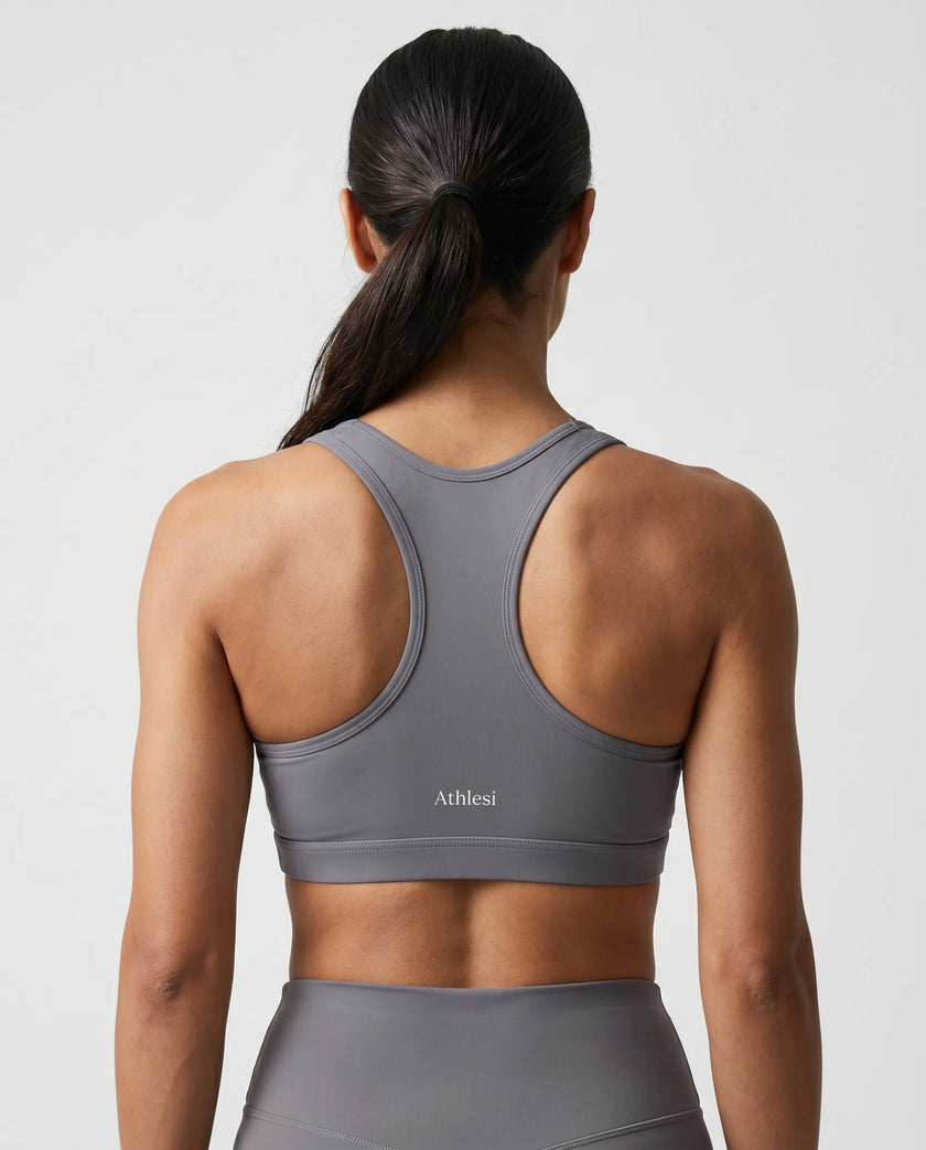 CoreForm Sports Bra in dark purple, back view styled on model
