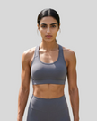 CoreForm Sports Bra in dark purple, front view styled on model