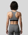 CoreForm Sports Bra in flower gray, back view styled on model