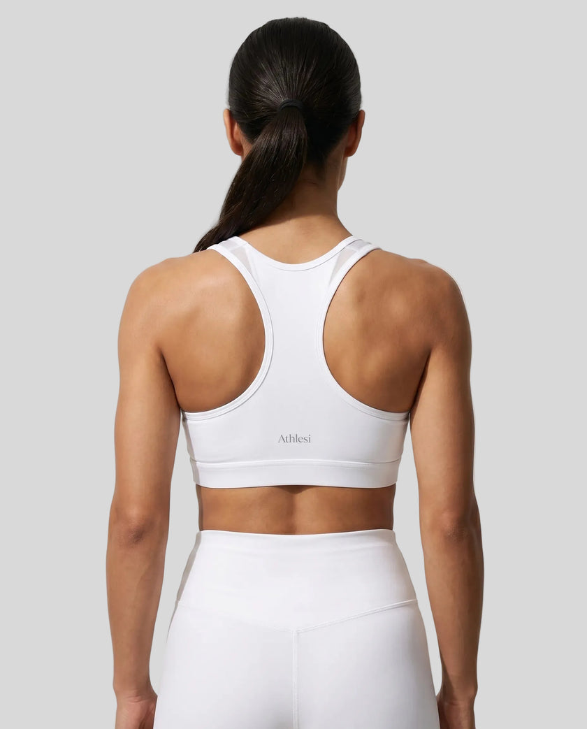 CoreForm Sports Bra in white, back view styled on model