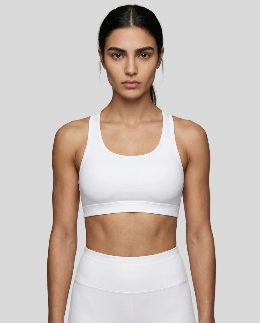 CoreForm Sports Bra in white, front view styled on model