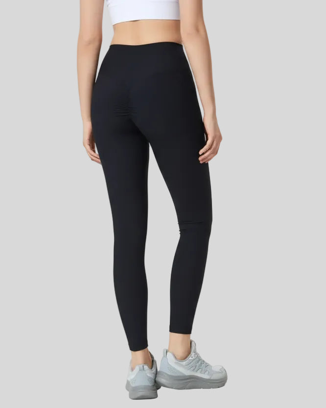 Angled back view of black ribbed CoreLift Sculpt Legging