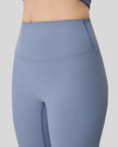 Closeup of ribbed high-waist waistband on light blue CoreLift Sculpt Legging