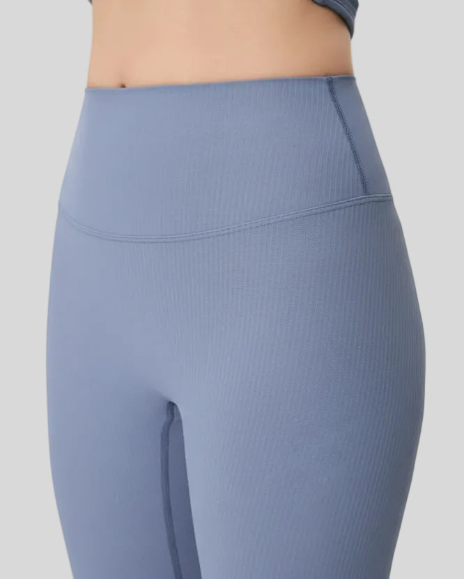 Closeup of ribbed high-waist waistband on light blue CoreLift Sculpt Legging