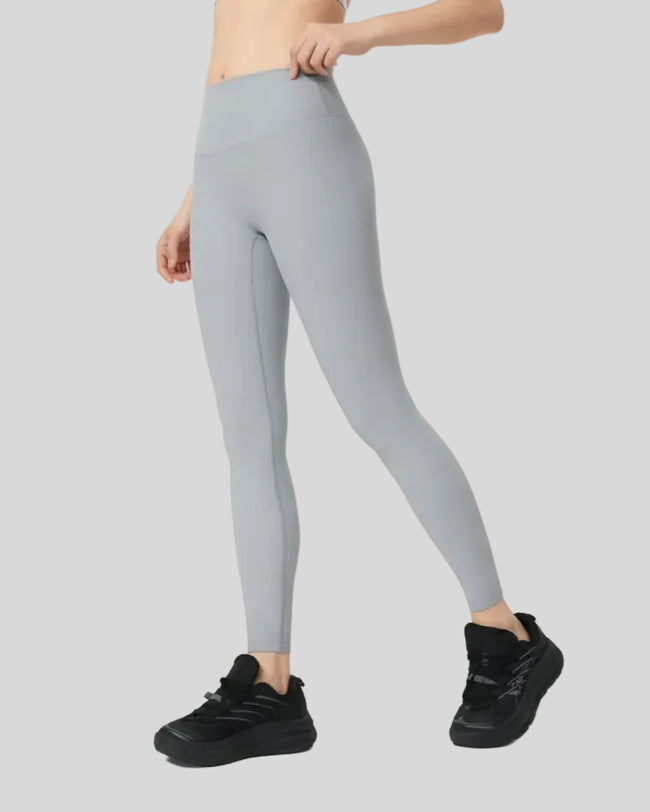 Left side view of light gray ribbed CoreLift Sculpt Legging
