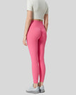 Angled back view of pink ribbed CoreLift Sculpt Legging