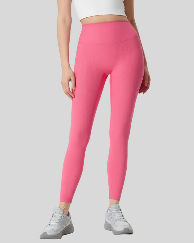 Angled front view of pink ribbed CoreLift Sculpt Legging