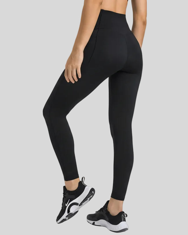 Back angled view emphasizing the sculpting lines and studio-ready design in black