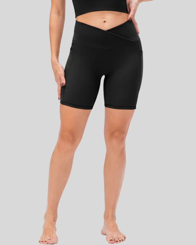 Athlesi CoreLift V-waist pocket short in black, front view