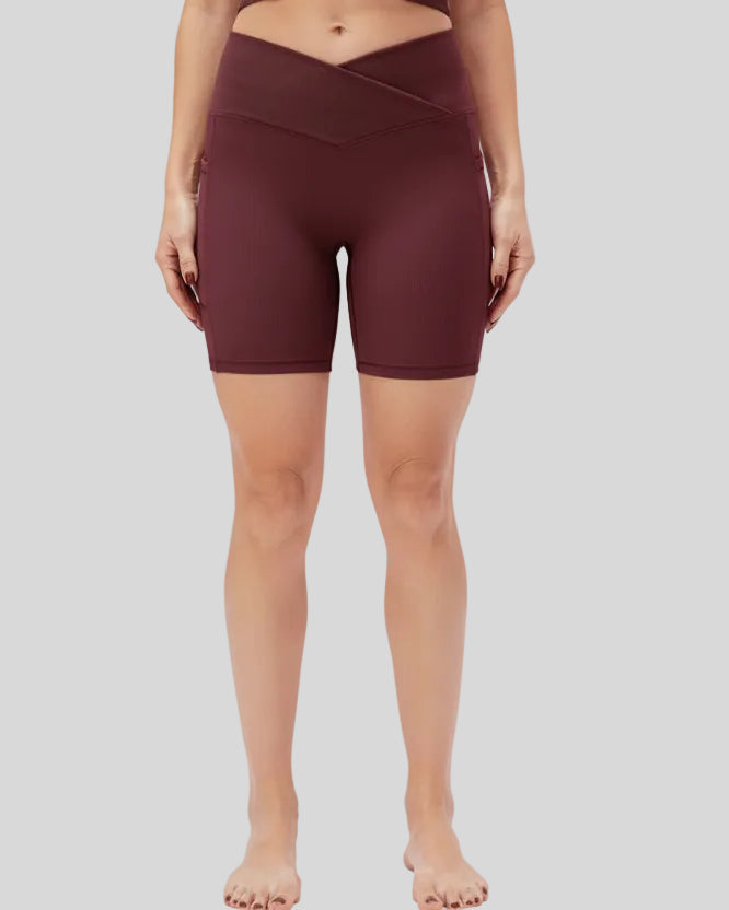 Athlesi CoreLift V-waist pocket short in burgundy, front view
