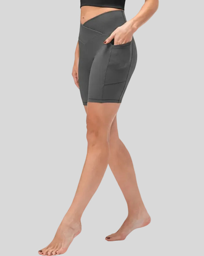 Athlesi CoreLift V-waist pocket short in dark gray, side view