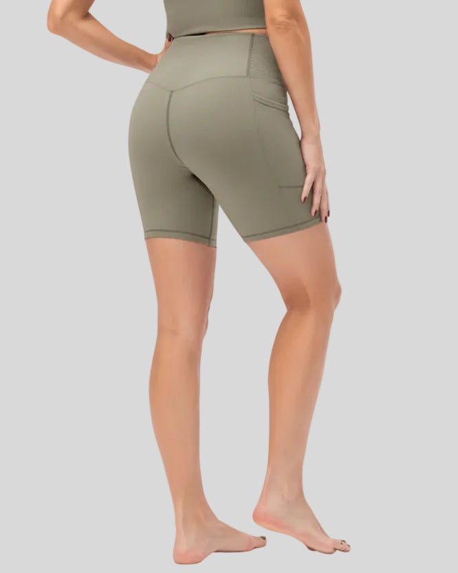 Athlesi CoreLift V-waist pocket short in tan, back angle view