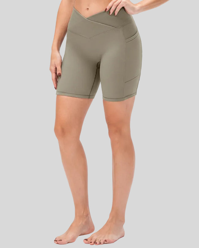 Athlesi CoreLift V-waist pocket short in tan, front angle view