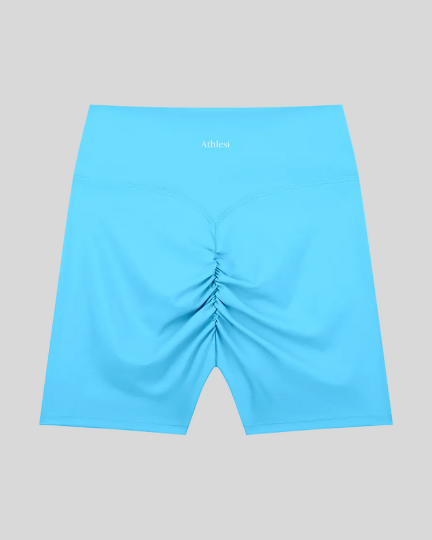 CoreLine Biker Shorts in blue, flatlay back view